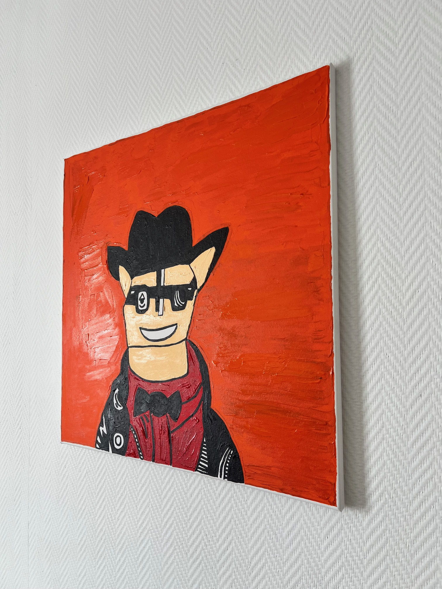Peinture_abstraite_personnage_60x60cm_sur_toile_couleur_noir_et_orange pop art moderne 