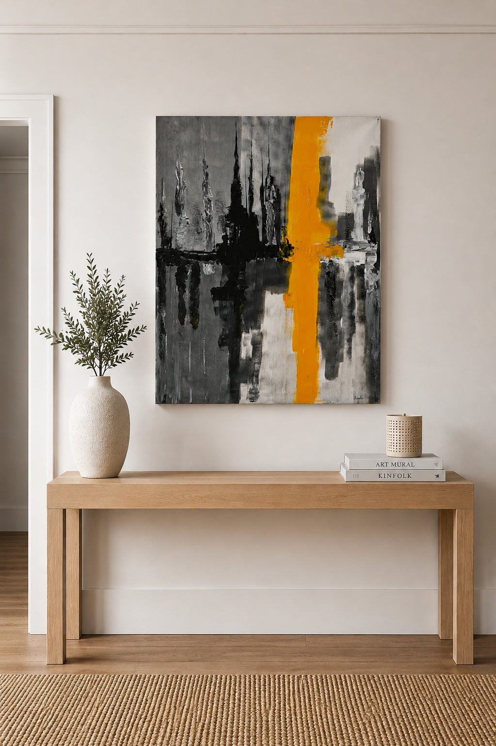 Décoration murale contemporaine avec un tableau abstrait aux couleurs gris, noir et jaune, réalisé sur toile coton pour un rendu soigné.