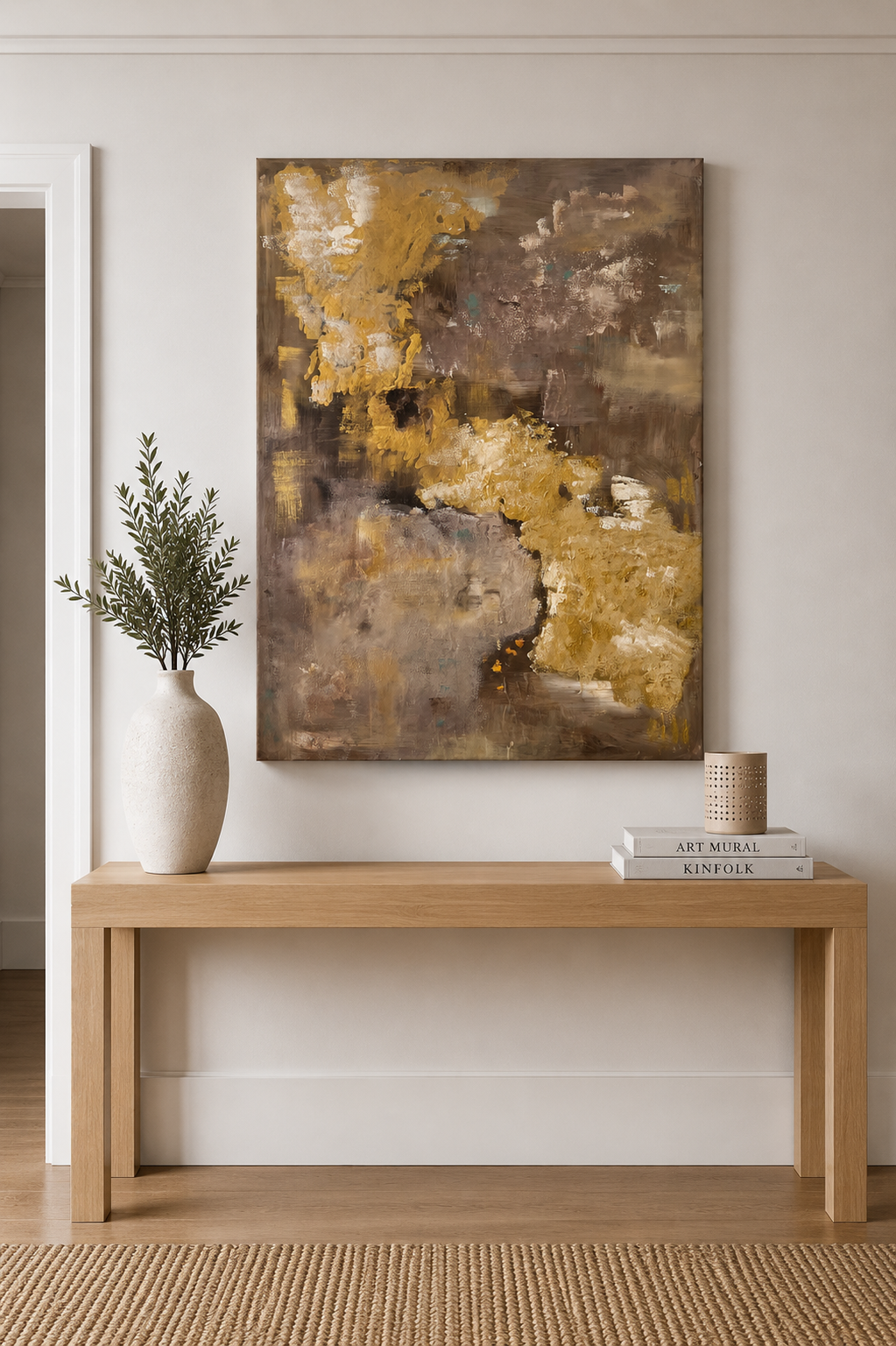 Idée décoration pour salon moderne avec un tableau abstrait dans des tons or, beige et brun, œuvre de Biacha, artiste peintre français.
