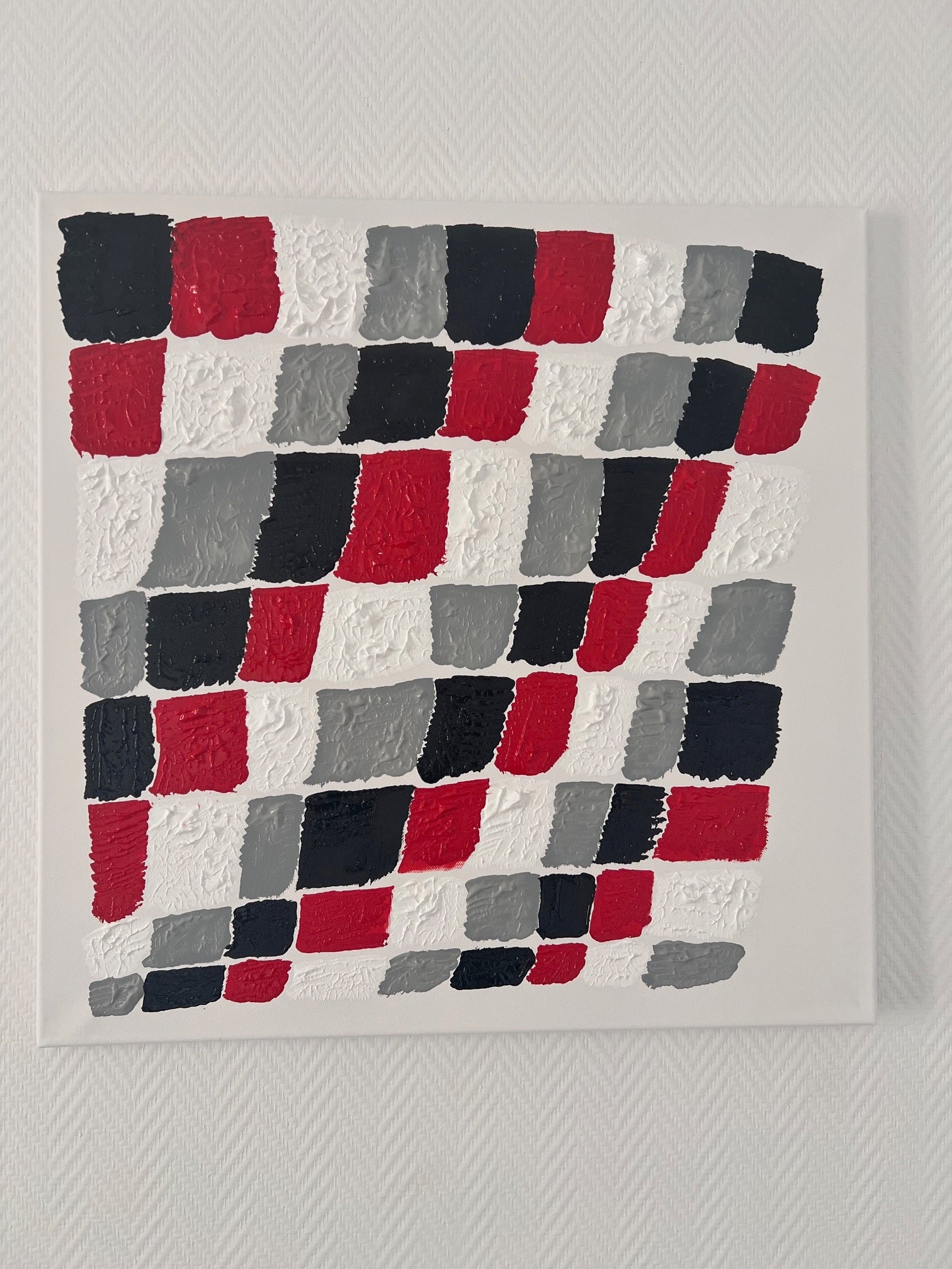 tableau abstrait moderne en relief noir rouge gris sur toile format carré damier  jeux de dame