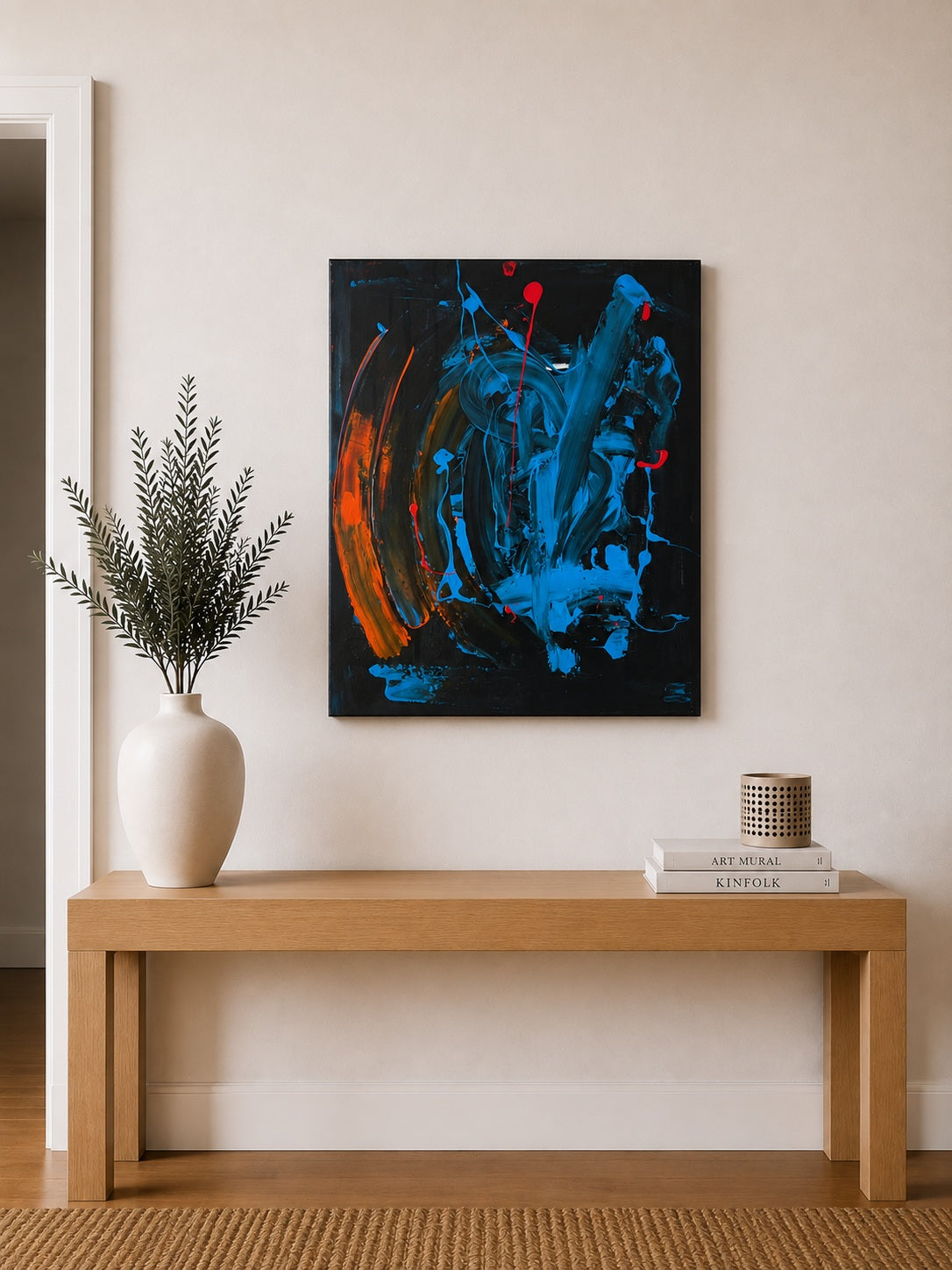 Tableau abstrait en peinture acrylique  sur toile aux couleurs bleu, noir et orange, création contemporaine.